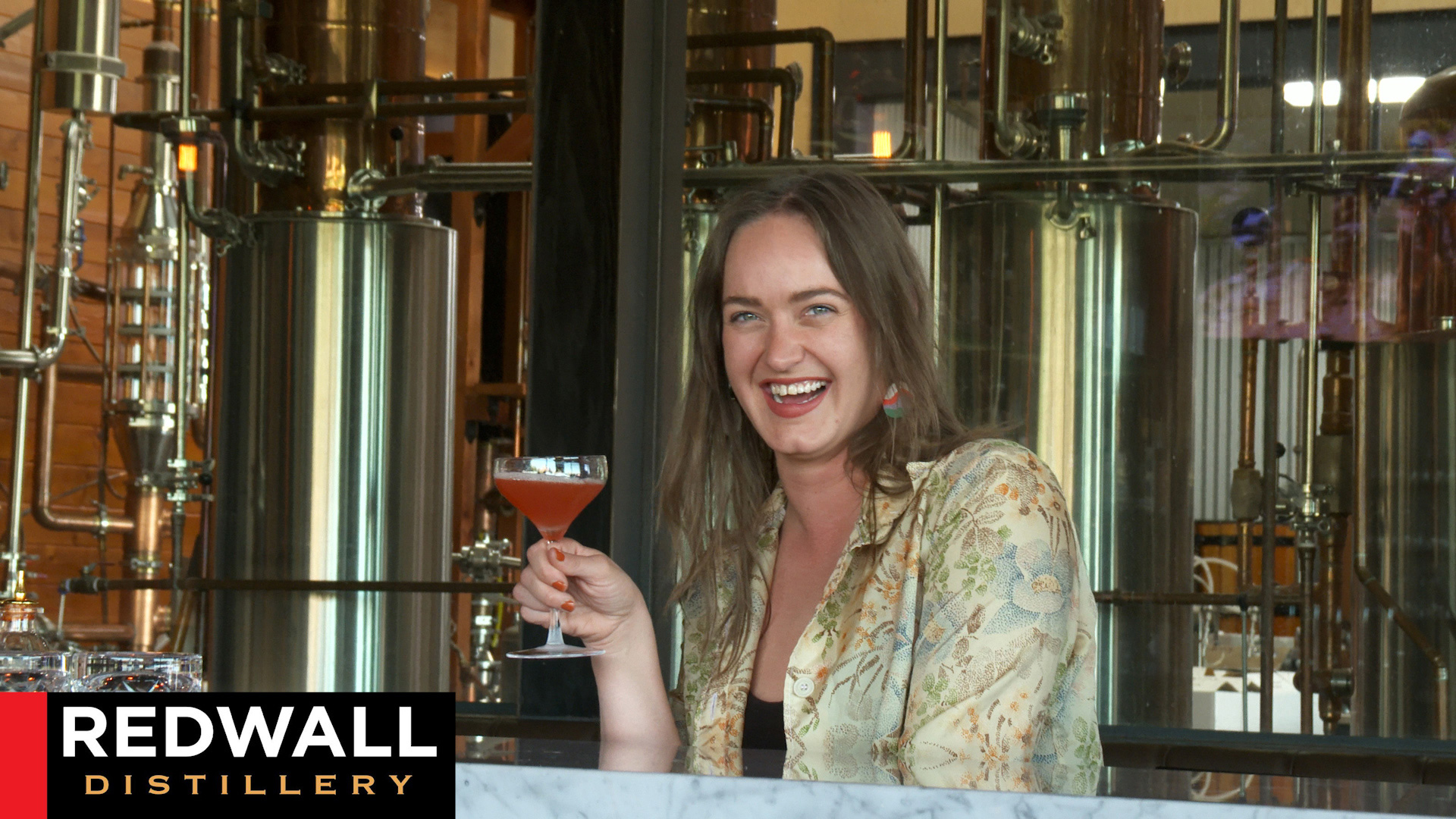Woman enjoying cocktail at Redwall Distillery in Sedona, Arizona